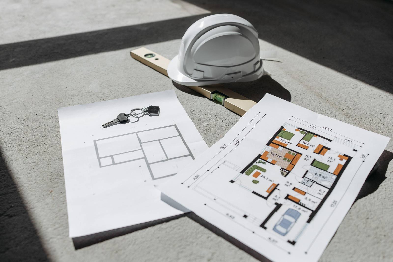 Building permit paperwork stamped and approved on a planning office desk