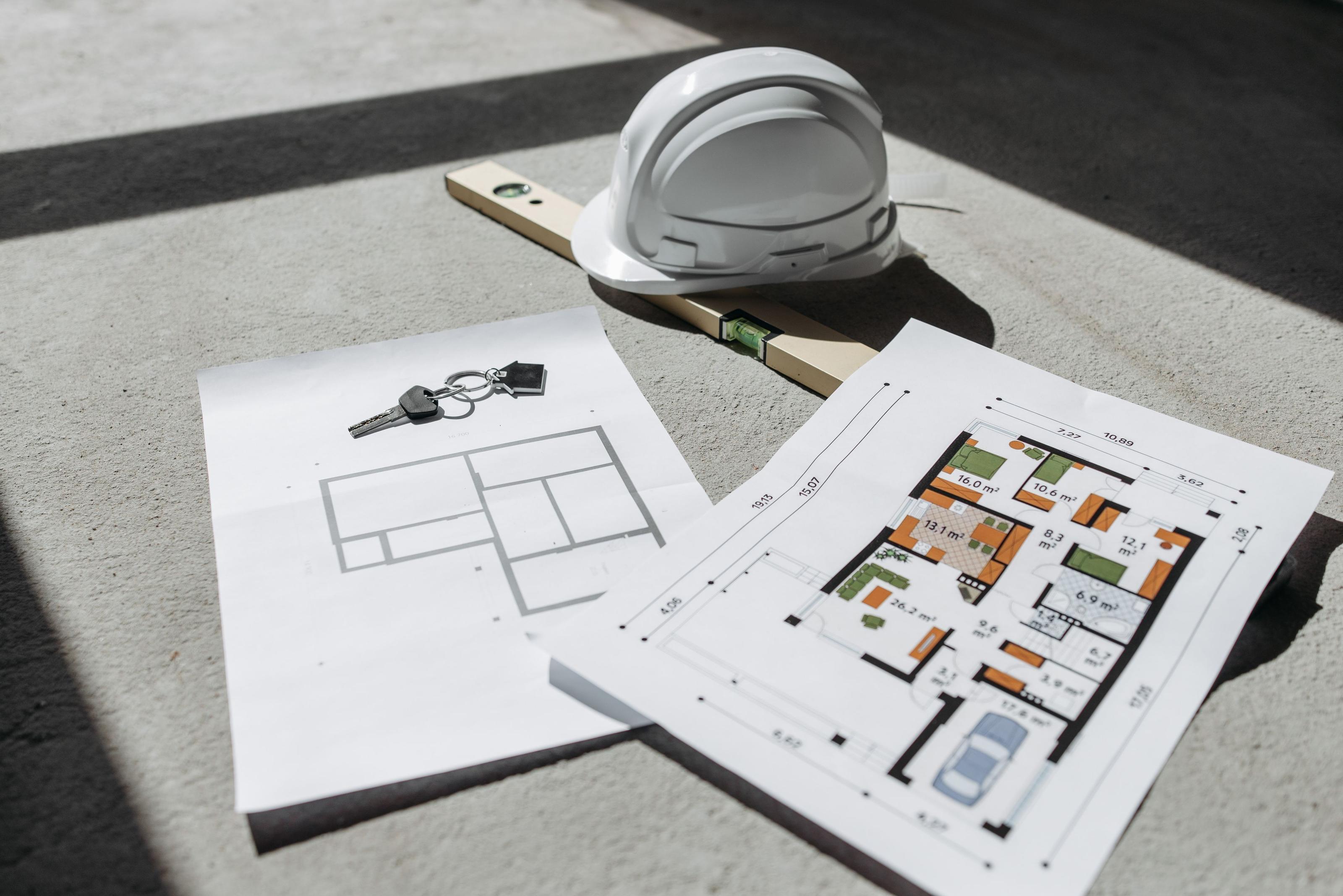 Building permit paperwork stamped and approved on a planning office desk