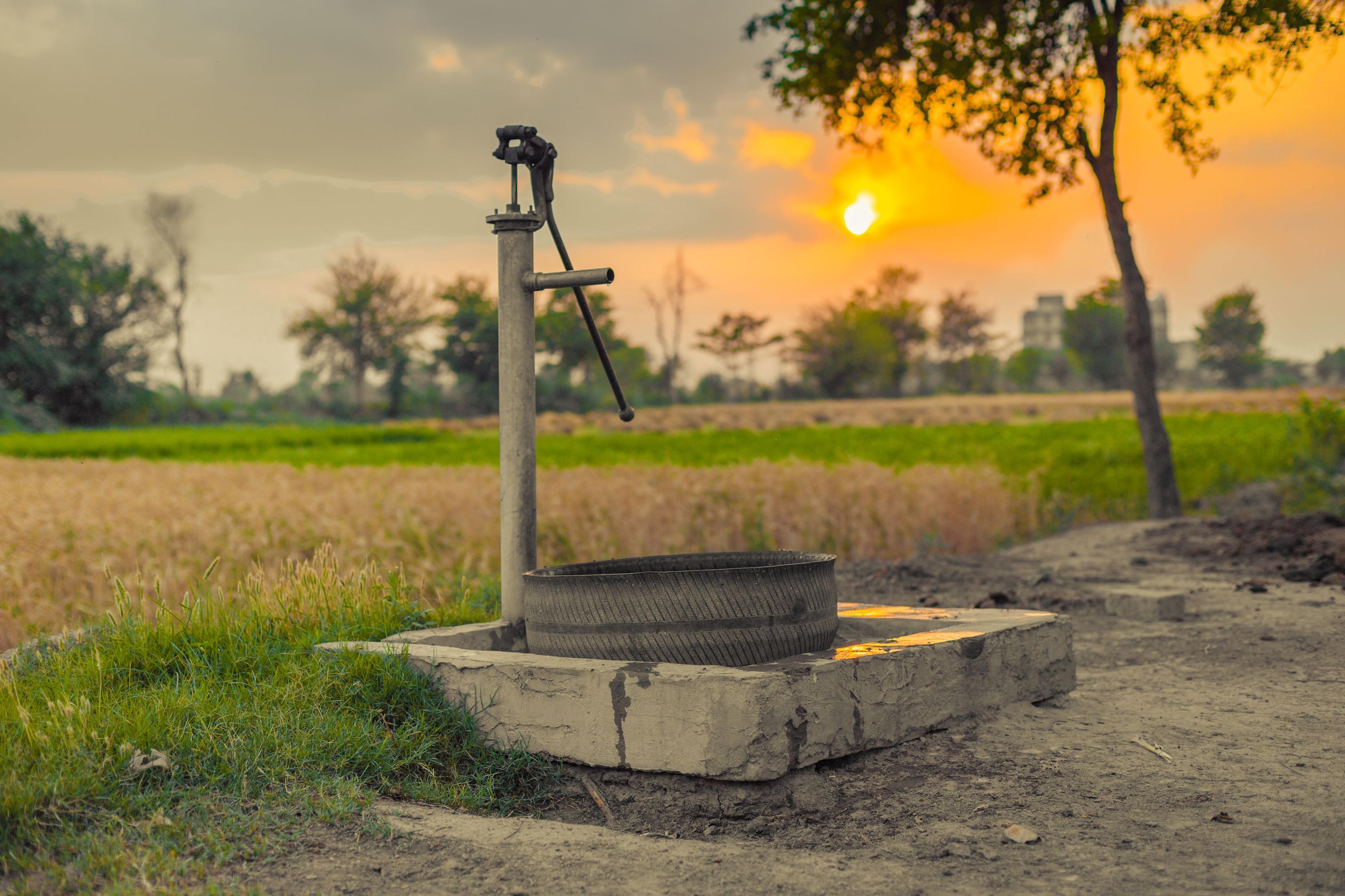 Rainwater storage tank beside a rural off-grid homestead