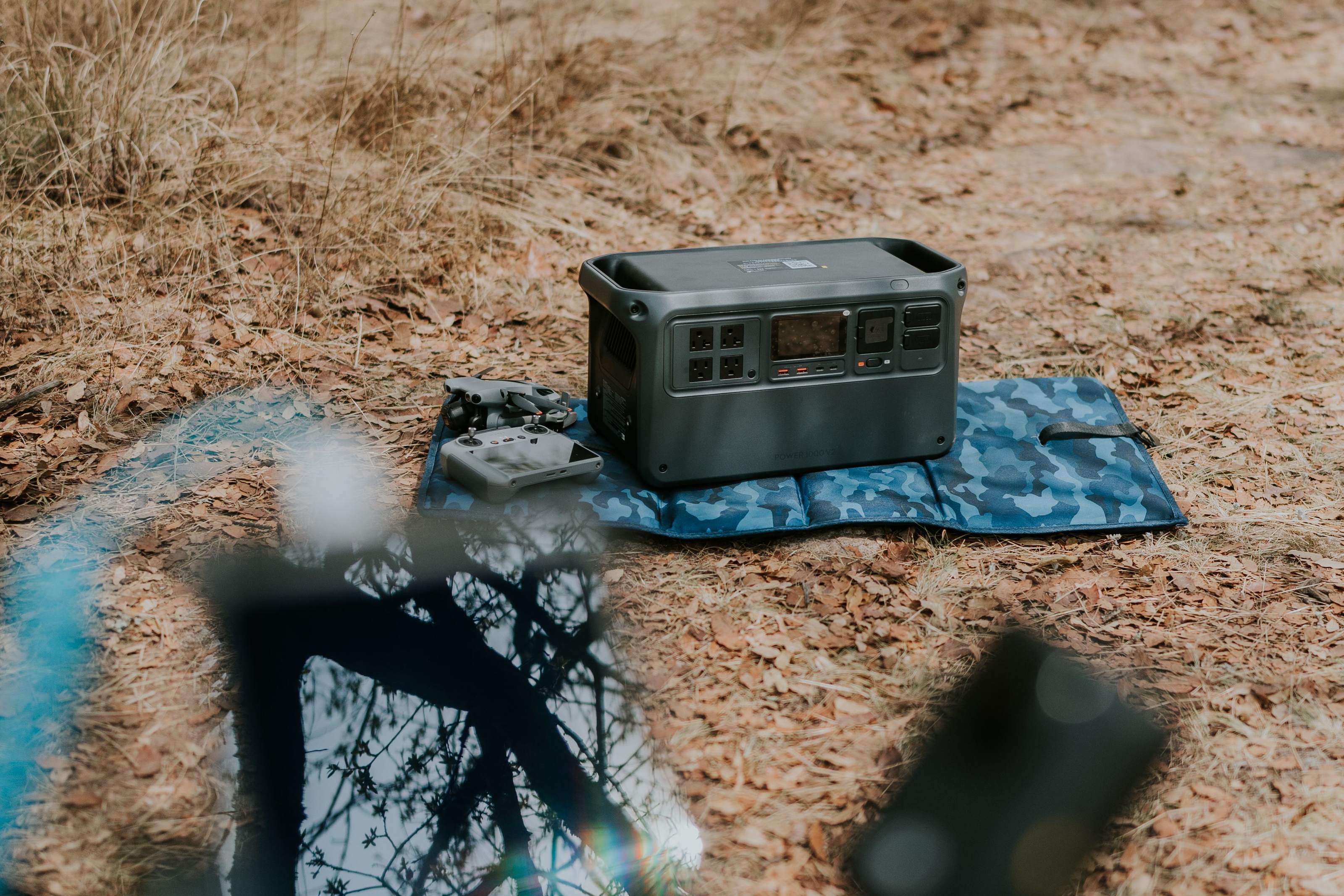 Portable power station and solar generator battery unit sitting outdoors